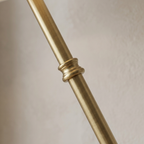 Gold stem and decorative collar detail